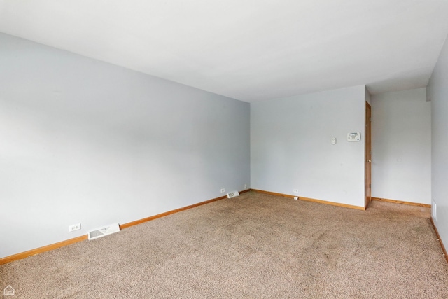 14526 Loomis Ave, Harvey, IL 60426 - carpeted empty room with baseboards