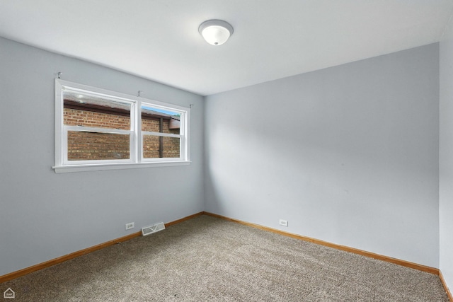 14526 Loomis Ave, Harvey, IL 60426 - unfurnished room featuring carpet floors and baseboards