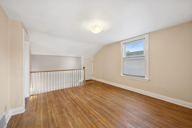 6912 N Osceola Ave, Chicago, IL 60631 - bonus room with wood-type flooring and vaulted ceiling