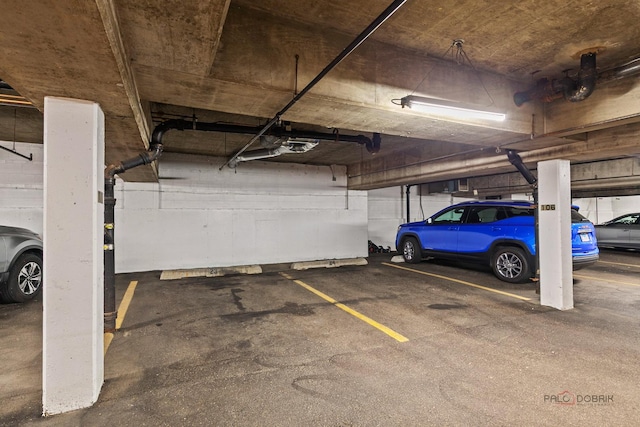 1350 N Western Ave Unit 106, Lake Forest, IL 60045 - parking deck featuring a garage door opener
