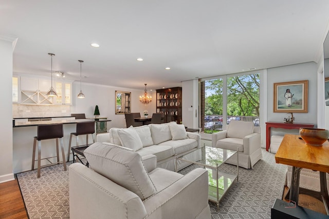 1350 N Western Ave Unit 106, Lake Forest, IL 60045 - living area featuring recessed lighting, plenty of natural light, a chandelier, and crown molding