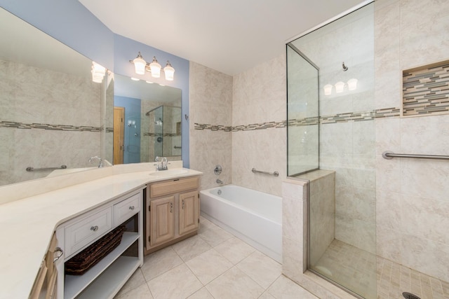 910 Persimmon Ln Unit B, Mount Prospect, IL 60056 - bathroom with a garden tub, tile patterned floors, vanity, and tiled shower