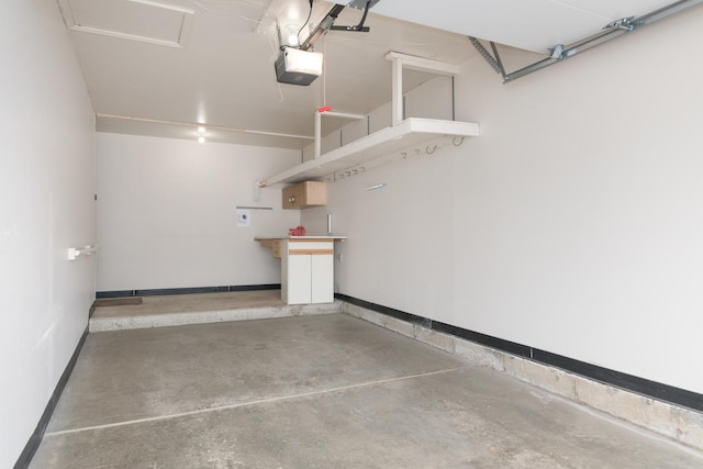 910 Persimmon Ln Unit B, Mount Prospect, IL 60056 - garage with a garage door opener and baseboards