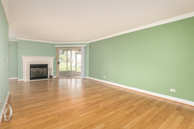 910 Persimmon Ln Unit B, Mount Prospect, IL 60056 - unfurnished living room with light wood-style flooring, a fireplace with flush hearth, and ornamental molding