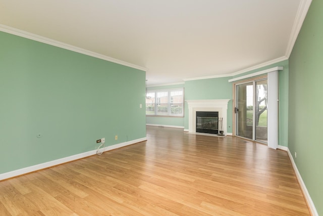 910 Persimmon Ln Unit B, Mount Prospect, IL 60056 - unfurnished living room featuring light wood-style flooring, crown molding, and a fireplace with flush hearth