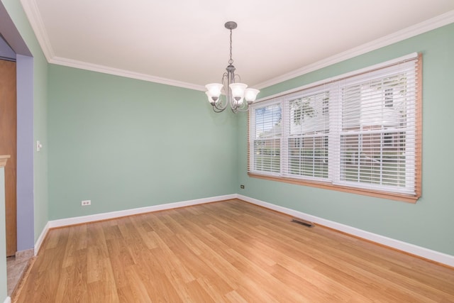 910 Persimmon Ln Unit B, Mount Prospect, IL 60056 - unfurnished room with a chandelier, ornamental molding, and light wood finished floors