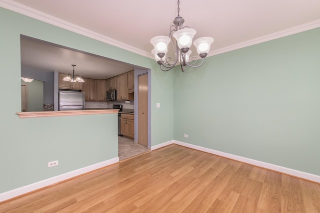 910 Persimmon Ln Unit B, Mount Prospect, IL 60056 - kitchen with stainless steel appliances, a chandelier, light wood-style flooring, ornamental molding, and pendant lighting