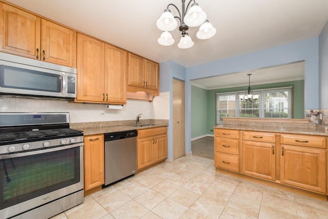 910 Persimmon Ln Unit B, Mount Prospect, IL 60056 - kitchen with appliances with stainless steel finishes, a chandelier, ornamental molding, decorative light fixtures, and light tile patterned flooring
