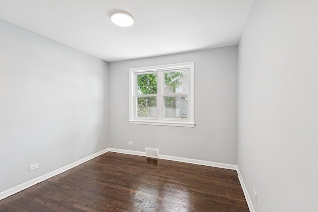 8753 S Troy Ave, Evergreen Park, IL 60805 - empty room with wood finished floors and baseboards