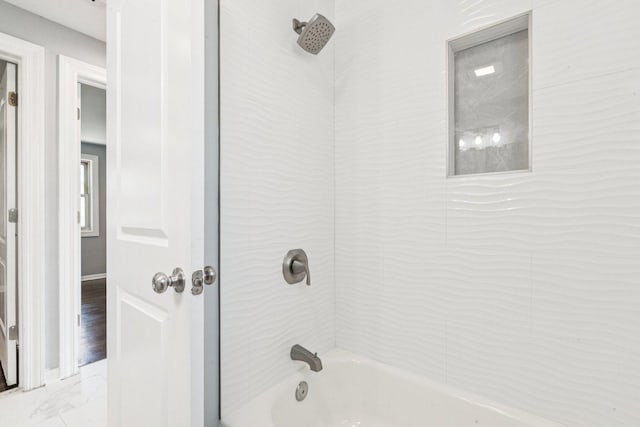 8753 S Troy Ave, Evergreen Park, IL 60805 - bathroom with bathtub / shower combination and marble look tiles