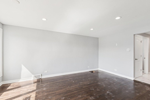 8753 S Troy Ave, Evergreen Park, IL 60805 - empty room with wood finished floors and recessed lighting