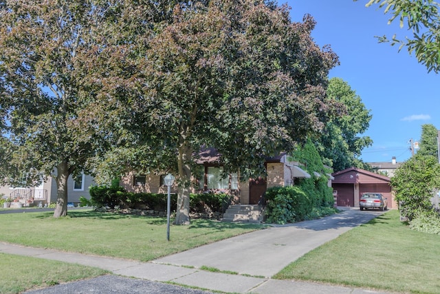 129 N Chase Ave, Bartlett, IL 60103 - view of property hidden behind natural elements featuring a front lawn