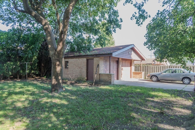 129 N Chase Ave, Bartlett, IL 60103 - view of side of home with brick siding and an outbuilding