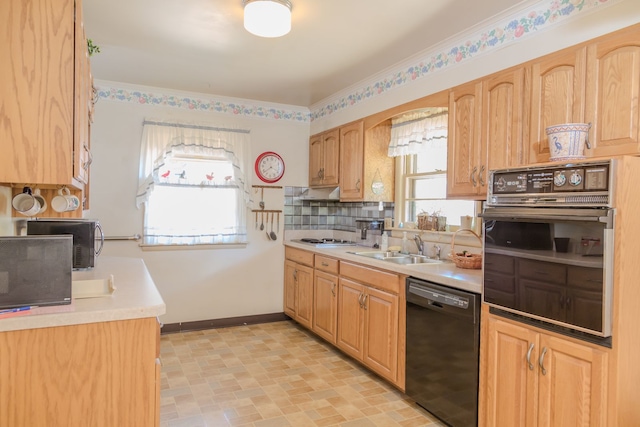 129 N Chase Ave, Bartlett, IL 60103 - kitchen with black appliances, light countertops, backsplash, and light brown cabinetry
