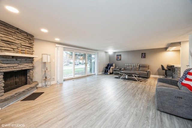 4 Cour La Salle Ct, Palos Hills, IL 60465 - living room featuring a stone fireplace, wood finished floors, and recessed lighting