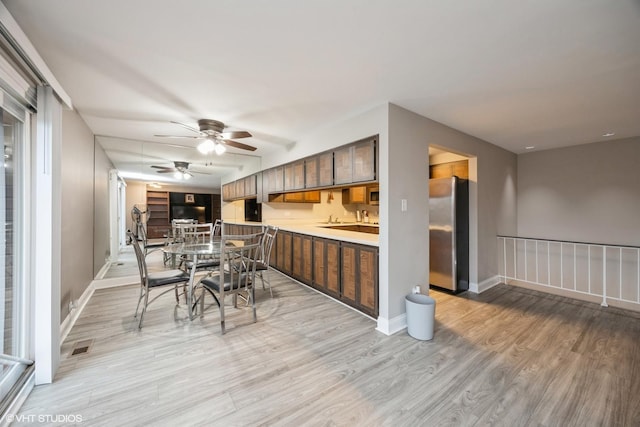 4 Cour La Salle Ct, Palos Hills, IL 60465 - dining space featuring ceiling fan and light wood finished floors
