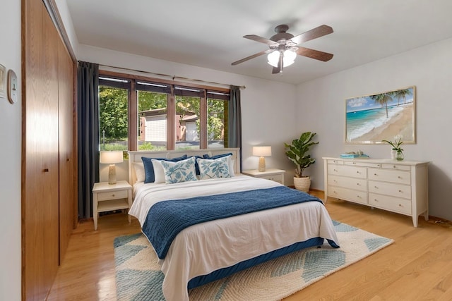 39081 N Sheridan Rd, Antioch, IL 60002 - bedroom featuring light wood-type flooring and a ceiling fan