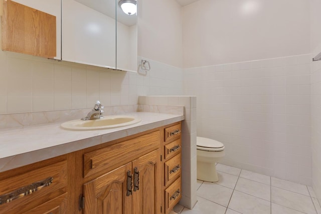 39081 N Sheridan Rd, Antioch, IL 60002 - bathroom featuring vanity, tile walls, and tile patterned floors