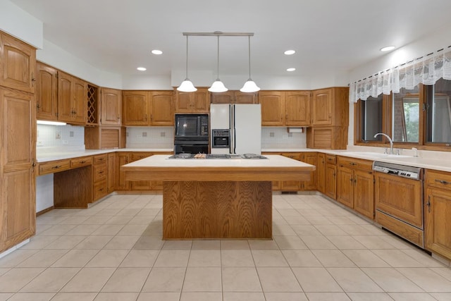 39081 N Sheridan Rd, Antioch, IL 60002 - kitchen with paneled dishwasher, white fridge with ice dispenser, a kitchen island, tasteful backsplash, and recessed lighting