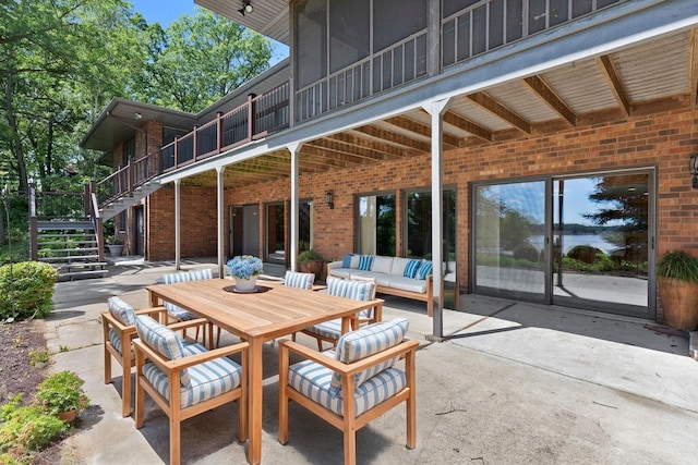 39081 N Sheridan Rd, Antioch, IL 60002 - view of patio / terrace with stairs, an outdoor hangout area, and outdoor dining space
