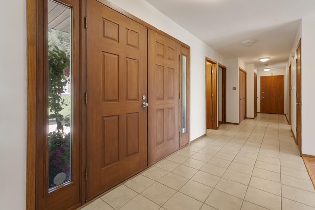 39081 N Sheridan Rd, Antioch, IL 60002 - foyer entrance with light tile patterned floors and baseboards