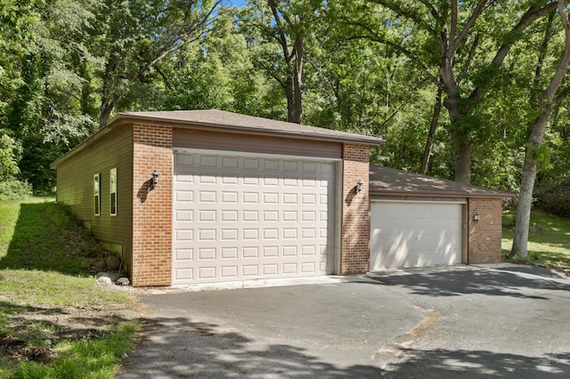 39081 N Sheridan Rd, Antioch, IL 60002 - detached garage featuring view of scattered trees