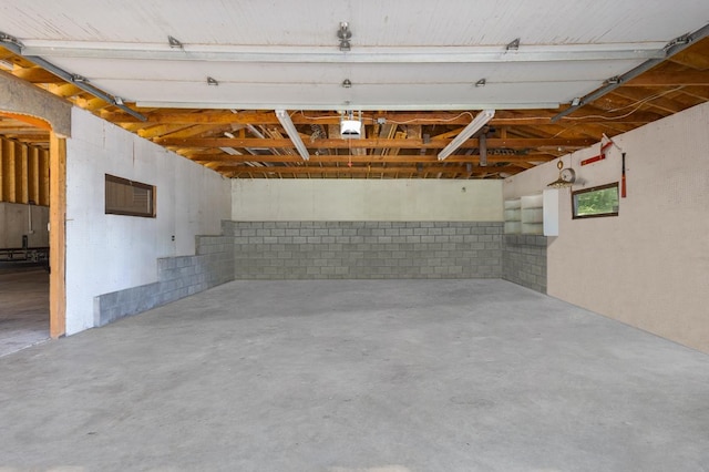 39081 N Sheridan Rd, Antioch, IL 60002 - garage featuring a garage door opener