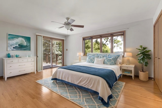39081 N Sheridan Rd, Antioch, IL 60002 - bedroom featuring access to exterior, light wood-style flooring, and a ceiling fan