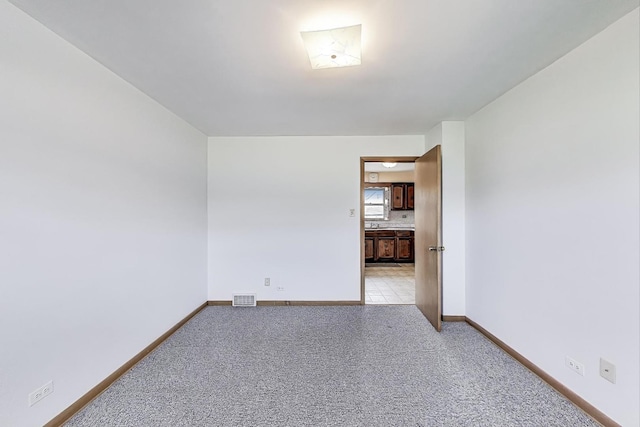 1927 Herbert Ave, Berkeley, IL 60163 - spare room featuring light colored carpet and baseboards