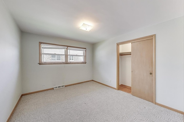 1927 Herbert Ave, Berkeley, IL 60163 - unfurnished bedroom with light colored carpet and baseboards