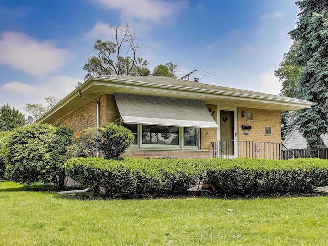 1927 Herbert Ave, Berkeley, IL 60163 - view of front facade with a front yard and brick siding