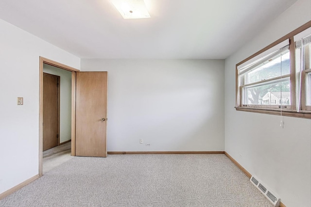 1927 Herbert Ave, Berkeley, IL 60163 - spare room featuring light colored carpet and baseboards