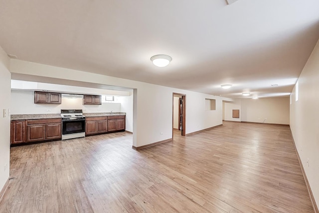 1927 Herbert Ave, Berkeley, IL 60163 - unfurnished living room featuring light wood-type flooring and baseboards