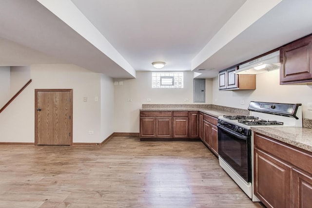 1927 Herbert Ave, Berkeley, IL 60163 - kitchen featuring black gas range oven, range hood, light wood-type flooring, and electric panel