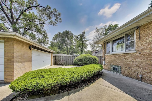 1927 Herbert Ave, Berkeley, IL 60163 - view of side of property featuring brick siding and a garage