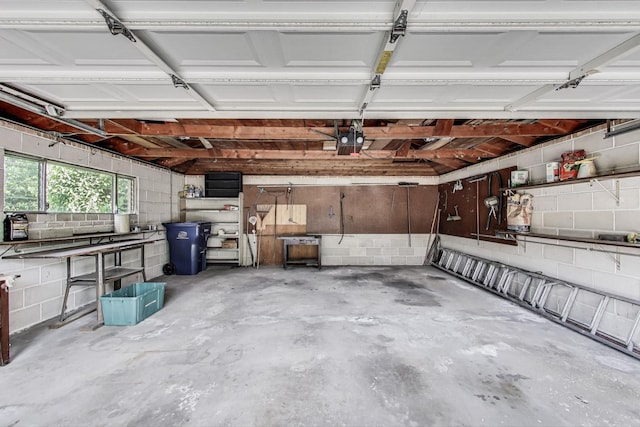 1927 Herbert Ave, Berkeley, IL 60163 - garage with a garage door opener and concrete block wall