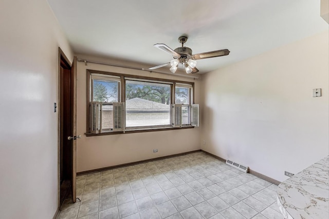 1927 Herbert Ave, Berkeley, IL 60163 - spare room with ceiling fan and light tile patterned flooring