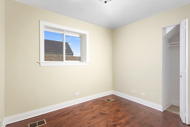 2649 W 21st Pl, Chicago, IL 60608 - unfurnished bedroom featuring dark wood finished floors and a closet