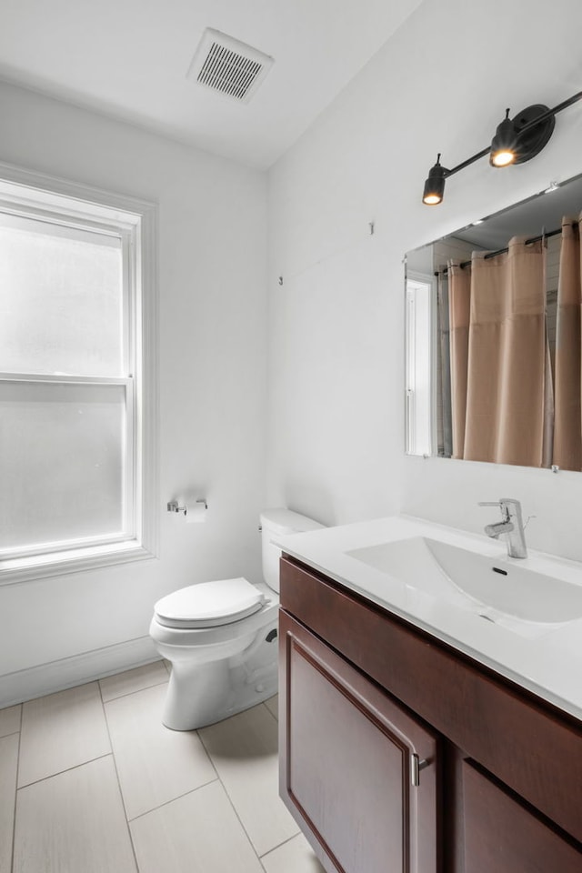 2649 W 21st Pl, Chicago, IL 60608 - bathroom featuring vanity, tile patterned flooring, and a shower with curtain