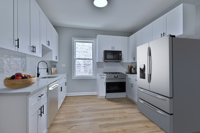 8004 S Ada St, Chicago, IL 60620 - kitchen with fridge with ice dispenser, black microwave, white range with gas stovetop, stainless steel dishwasher, and tasteful backsplash