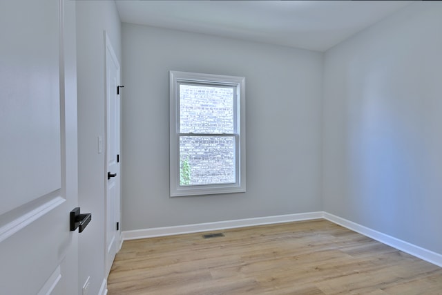8004 S Ada St, Chicago, IL 60620 - empty room with light wood-type flooring