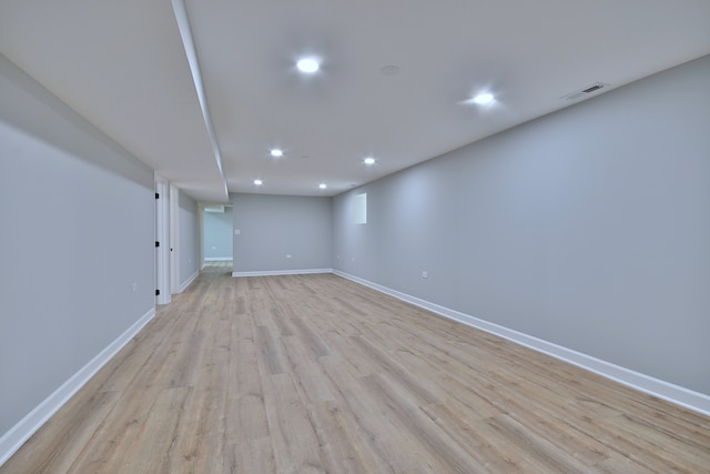 8004 S Ada St, Chicago, IL 60620 - finished basement with light wood-type flooring and recessed lighting