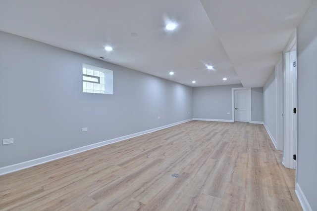 8004 S Ada St, Chicago, IL 60620 - below grade area with light wood-style floors and recessed lighting