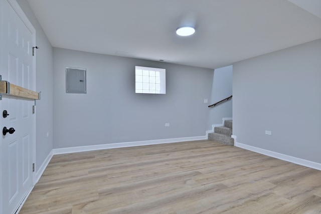 8004 S Ada St, Chicago, IL 60620 - basement with electric panel, stairs, and light wood-style flooring