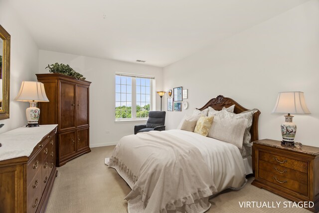 2660 Summit Dr Unit 302, Glenview, IL 60025 - bedroom with light colored carpet and baseboards