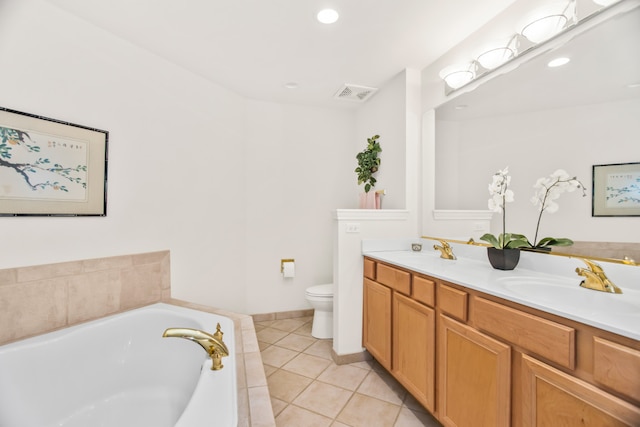 2660 Summit Dr Unit 302, Glenview, IL 60025 - bathroom featuring double vanity, a bath, tile patterned flooring, and recessed lighting