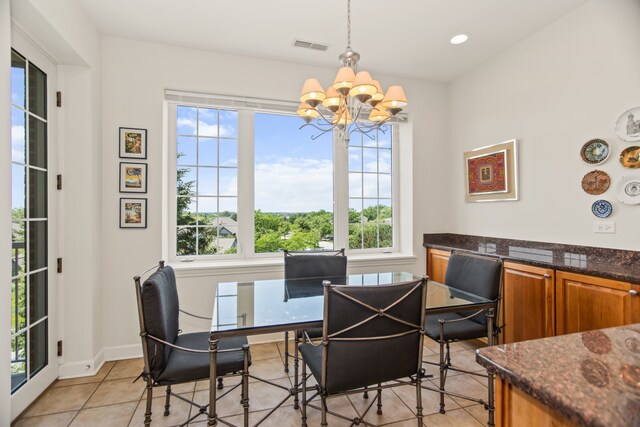 2660 Summit Dr Unit 302, Glenview, IL 60025 - dining space with a chandelier, plenty of natural light, light tile patterned flooring, and a desk