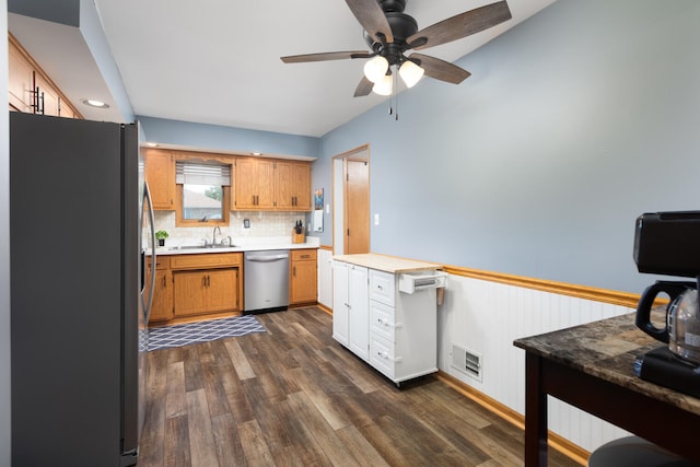 15317 S 73rd Ave Unit 8, Orland Park, IL 60462 - kitchen with freestanding refrigerator, stainless steel dishwasher, dark wood-type flooring, a ceiling fan, and wainscoting