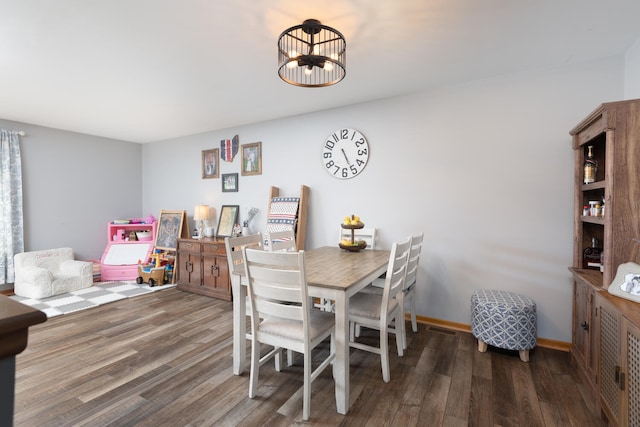 15317 S 73rd Ave Unit 8, Orland Park, IL 60462 - dining room featuring wood finished floors and a chandelier