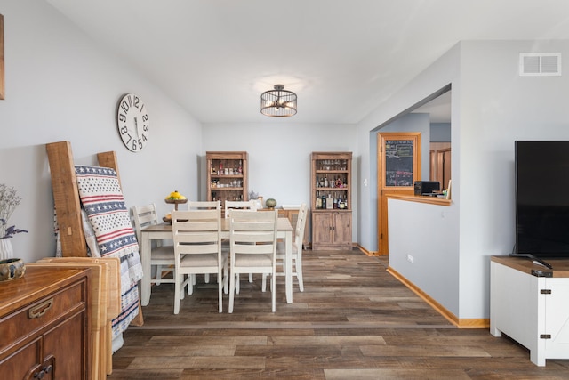 15317 S 73rd Ave Unit 8, Orland Park, IL 60462 - dining space with dark wood-style floors and a chandelier